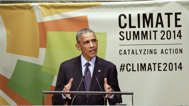 United States President Barack Obama addresses the Climate Summit, at United Nations headquarters, Tuesday, Sept. 23, 2014. (AP Photo/Richard Drew)